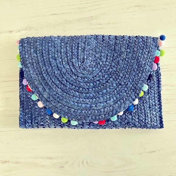 Handbags - Woven Clutch with Colorful Pom Poms